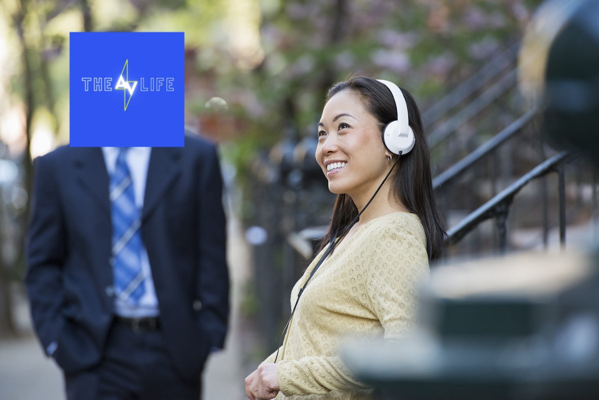 a-woman-wearing-headphones-and-a-man-in-a-suit-by-2023-11-27-04-55-37-utc