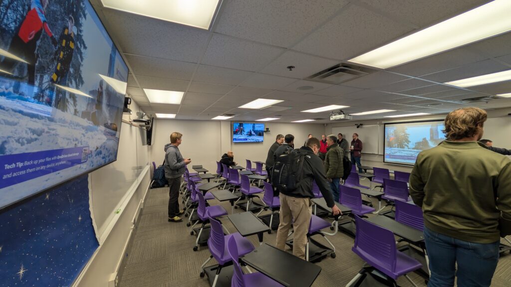 Classroom with multiple displays and chairs