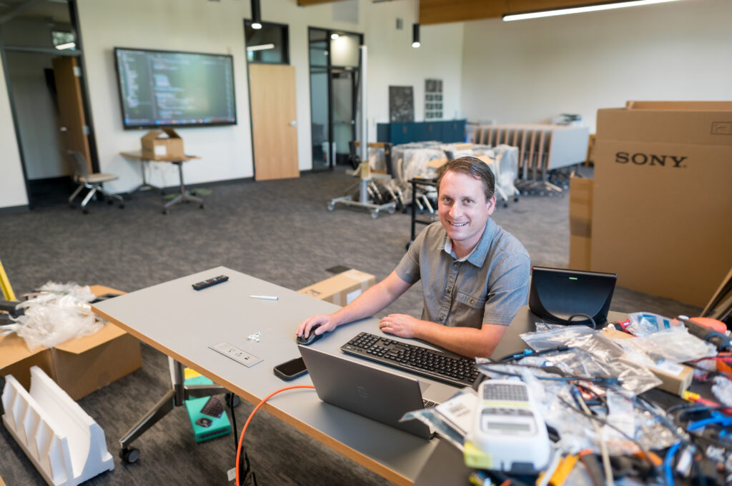 Matt working on a computer