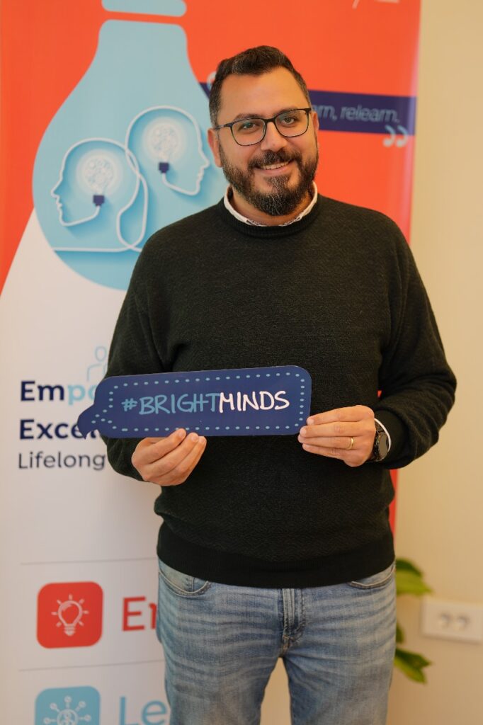 Sameh with a name placard