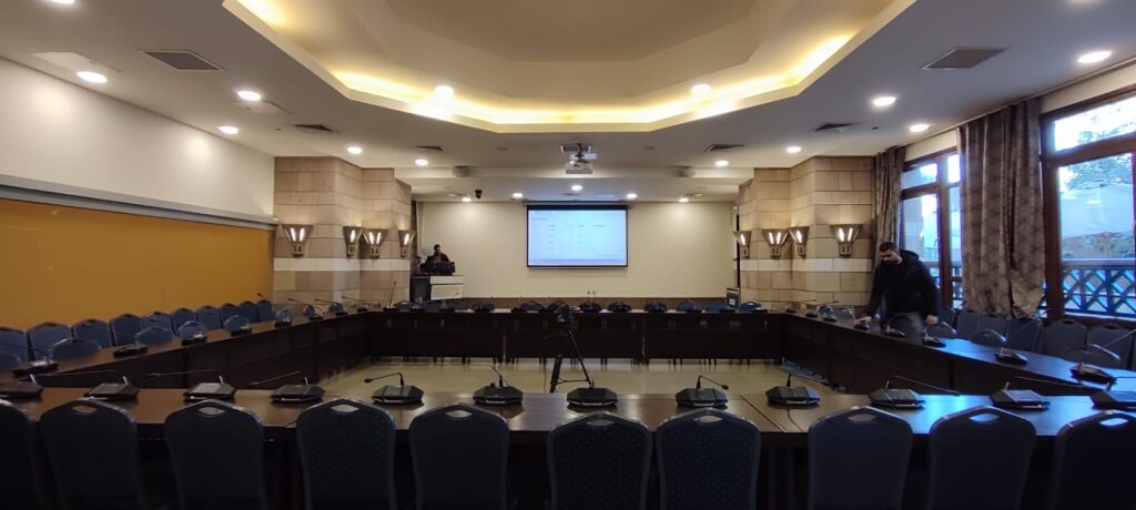 Sameh and other setting up conferencing space